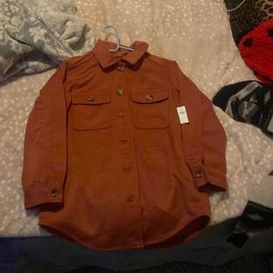 size small, winter jacket, never worn from old navy! darker orange